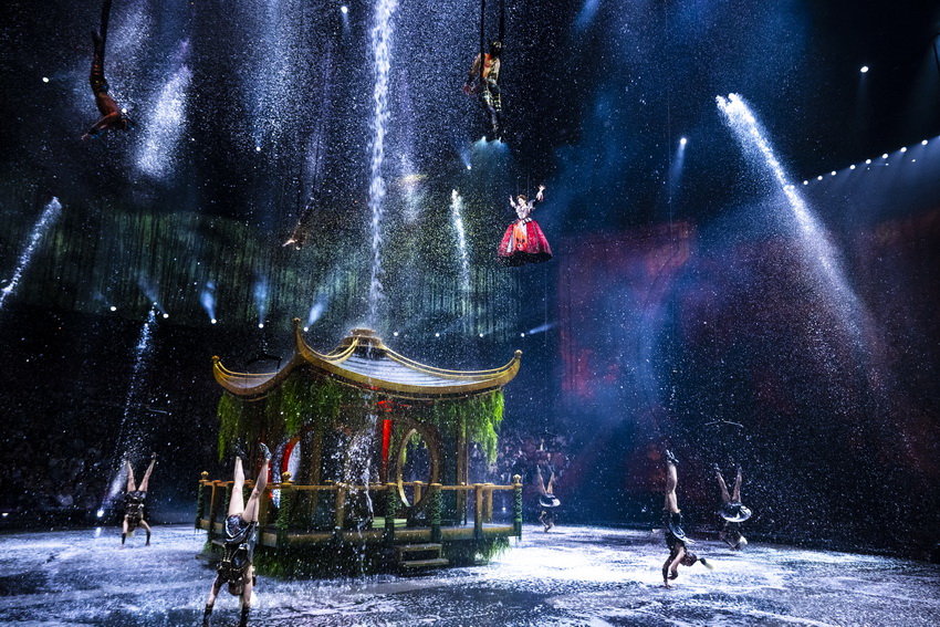Performers in a Magic Garden scene